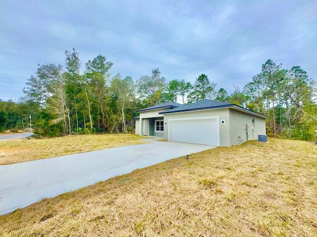 garage with a lawn