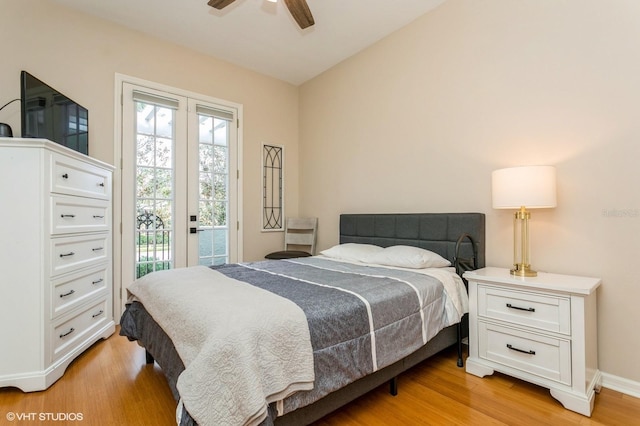 bedroom featuring access to outside, ceiling fan, and light wood-type flooring