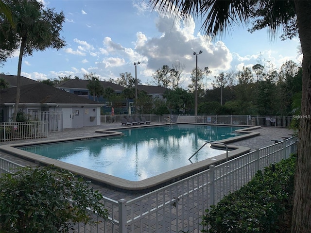 view of pool featuring a patio area