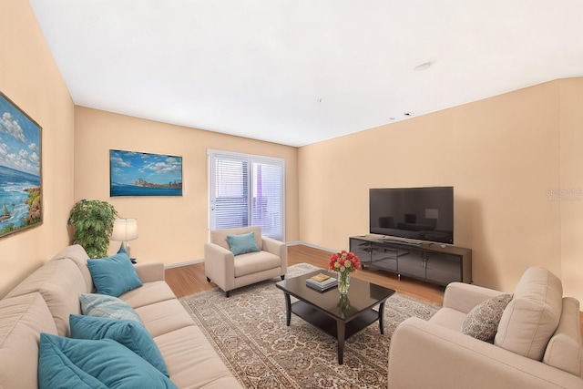 living room with light hardwood / wood-style flooring