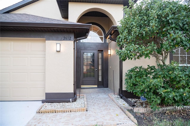 property entrance featuring a garage