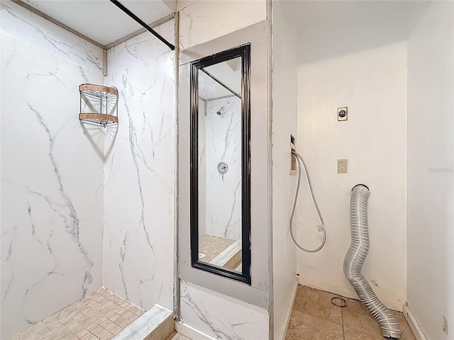 interior space with tiled shower