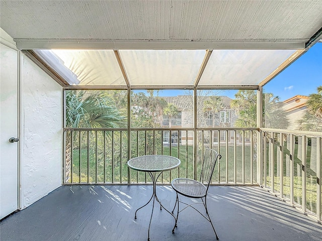 unfurnished sunroom with a healthy amount of sunlight