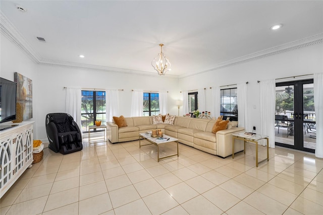 tiled living room featuring french doors, an inviting chandelier, a wealth of natural light, and ornamental molding