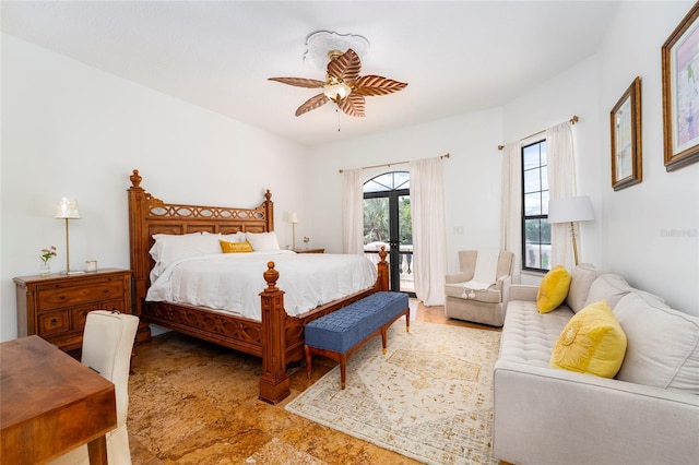 bedroom featuring ceiling fan, access to outside, and french doors