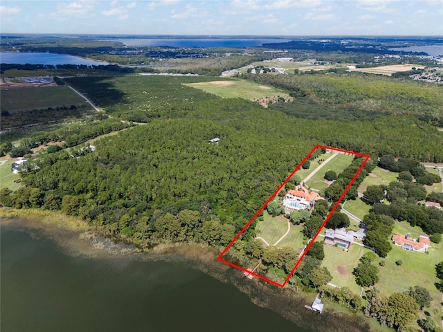 birds eye view of property featuring a water view