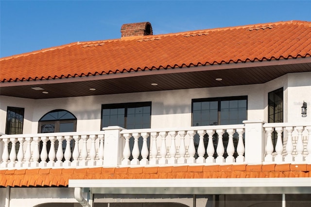 11148 Lane Park Rd, Tavares, FL 32778 - back of house with a balcony