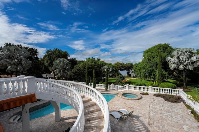 11148 Lane Park Rd, Tavares, FL 32778 - view of swimming pool featuring an in ground hot tub and a patio