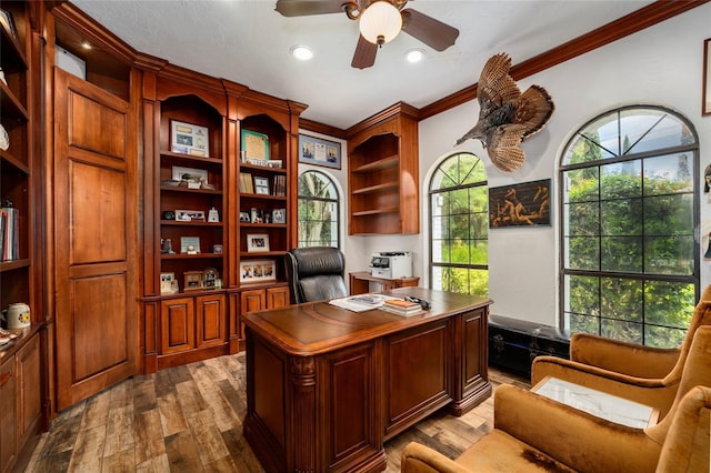 11148 Lane Park Rd, Tavares, FL 32778 - office area with crown molding, ceiling fan, and light hardwood / wood-style flooring