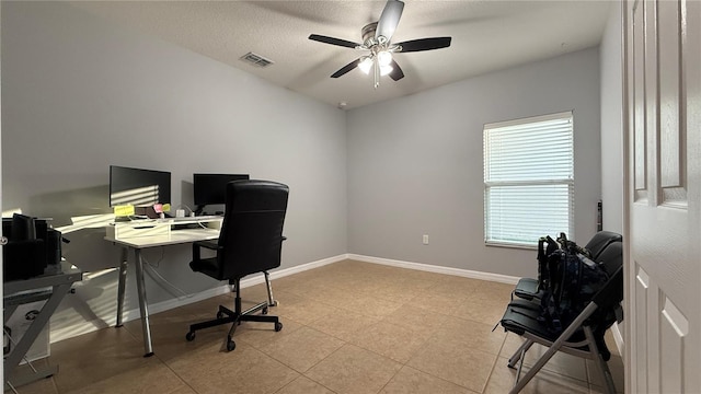 office space with ceiling fan