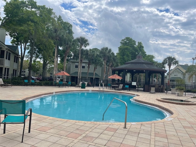 view of pool featuring a gazebo and a patio area