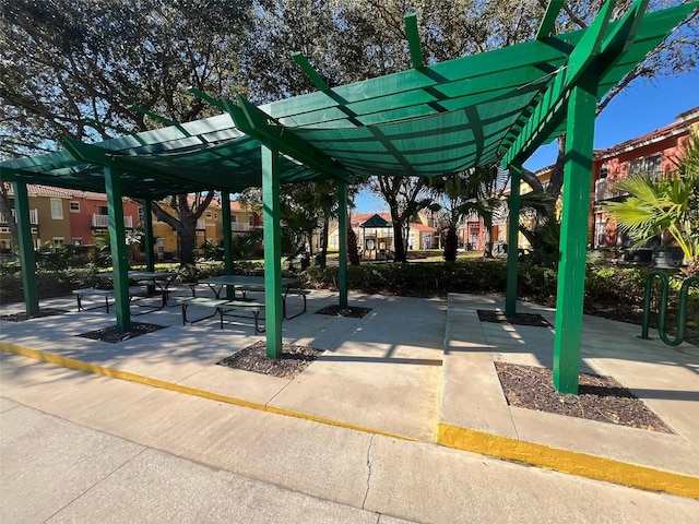 view of home's community with a pergola