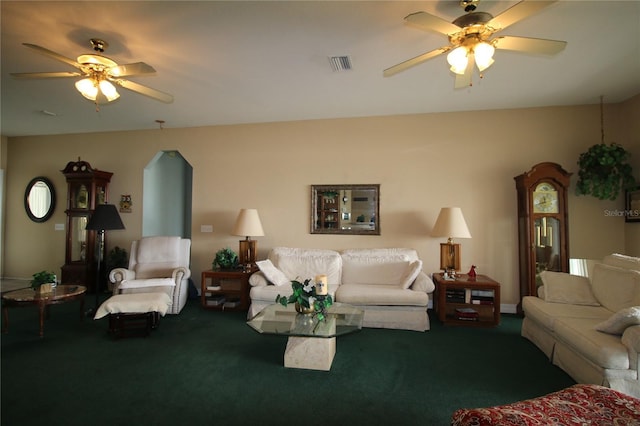 living room with ceiling fan and carpet flooring