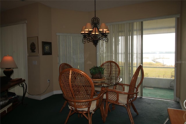 carpeted dining space with an inviting chandelier