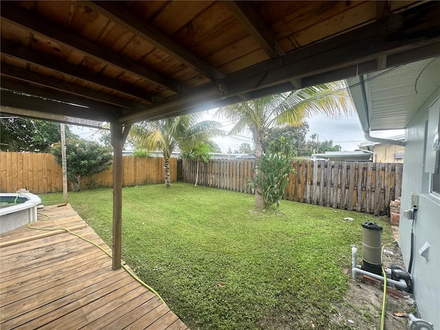 view of yard featuring a wooden deck