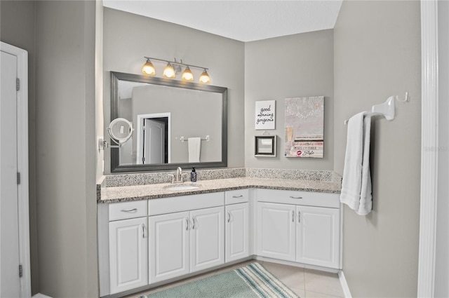 bathroom with vanity and tile patterned floors