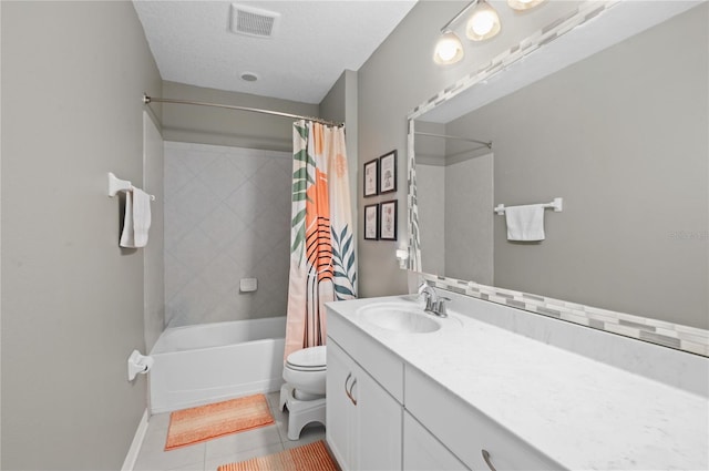 full bathroom featuring toilet, shower / bathtub combination with curtain, tile patterned floors, a textured ceiling, and vanity