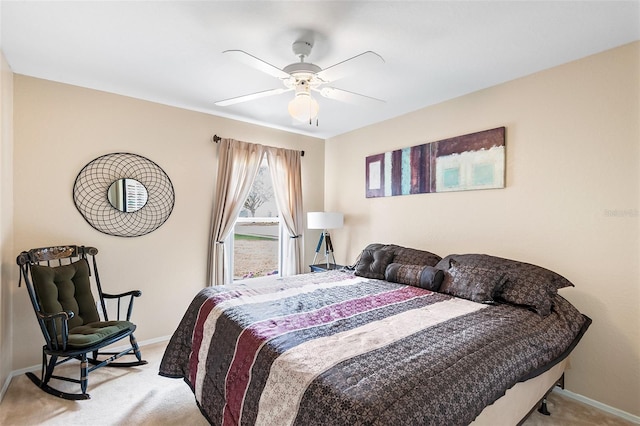 bedroom with light carpet and ceiling fan