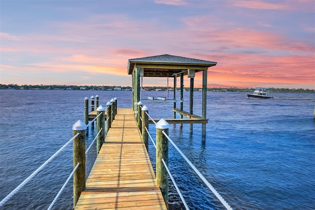 dock area with a water view