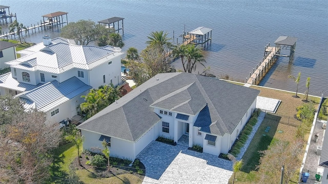 drone / aerial view featuring a water view