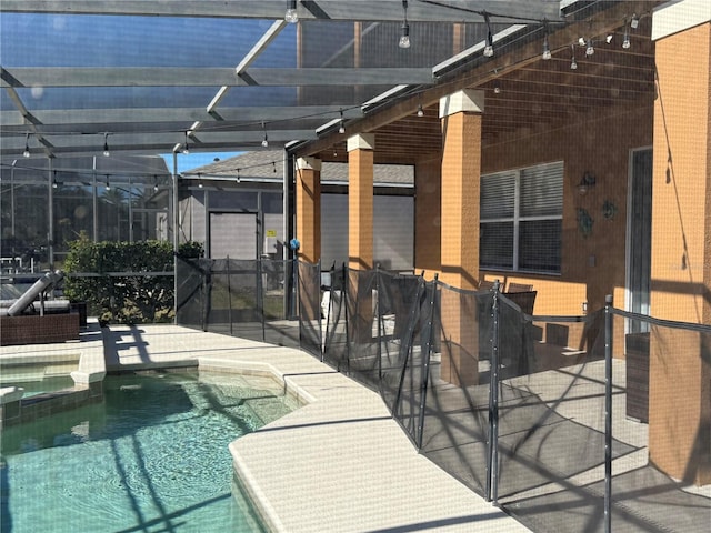 view of swimming pool with a patio area