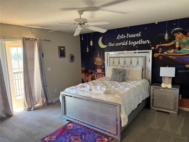 bedroom with ceiling fan, a textured ceiling, and carpet floors