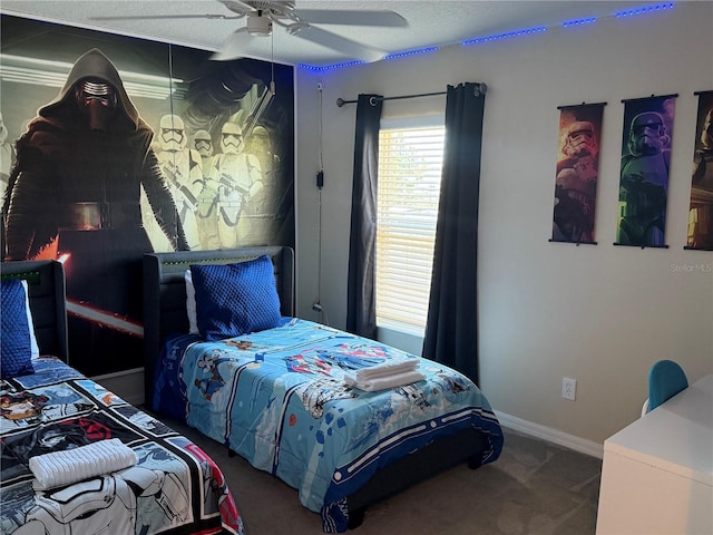 bedroom featuring ceiling fan and carpet floors