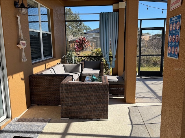 sunroom featuring plenty of natural light