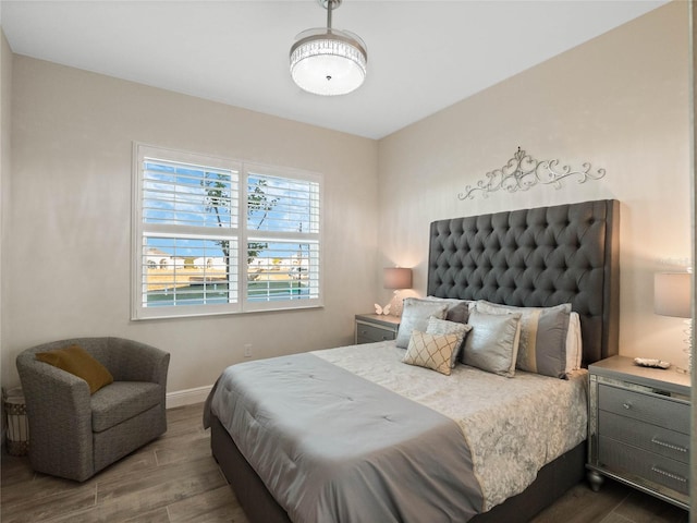 bedroom featuring dark hardwood / wood-style floors