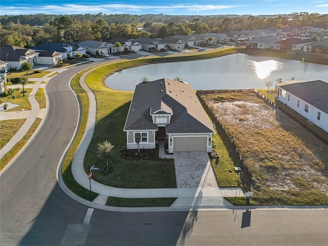 drone / aerial view featuring a water view