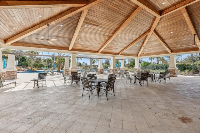 view of patio with a gazebo and a community pool