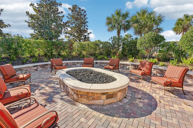 view of patio featuring a fire pit