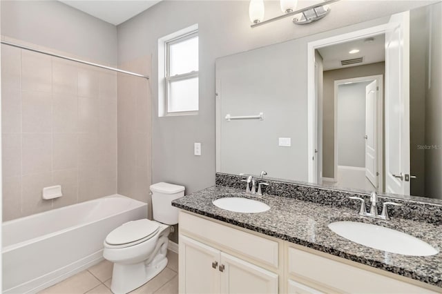 bathroom with visible vents, tile patterned flooring, a sink, and toilet