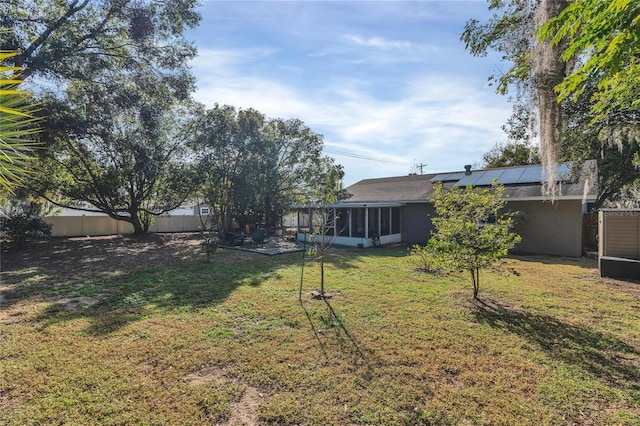 view of yard featuring a sunroom