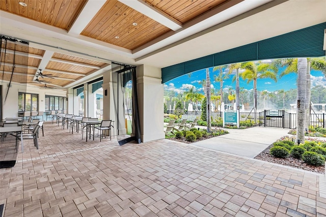 view of patio featuring ceiling fan