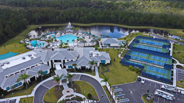 birds eye view of property featuring a water view