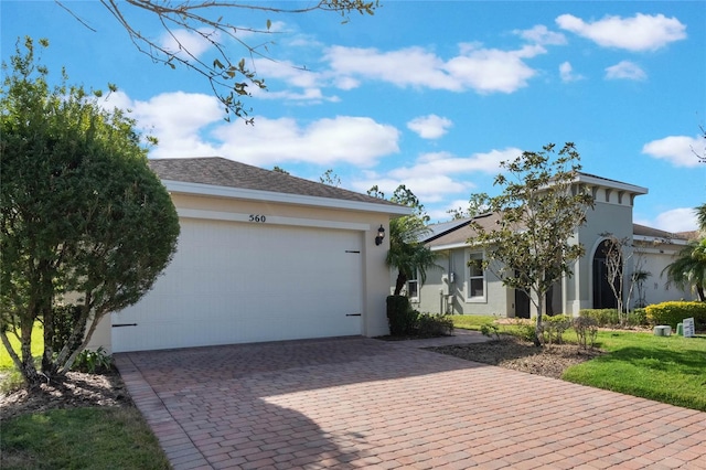 view of front of house with a garage