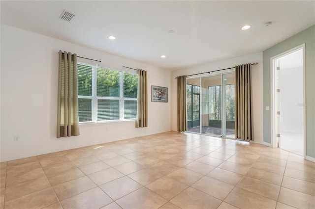 view of tiled spare room