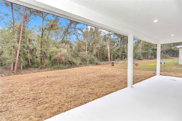 view of yard with a patio area