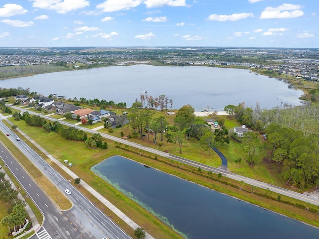 birds eye view of property featuring a water view