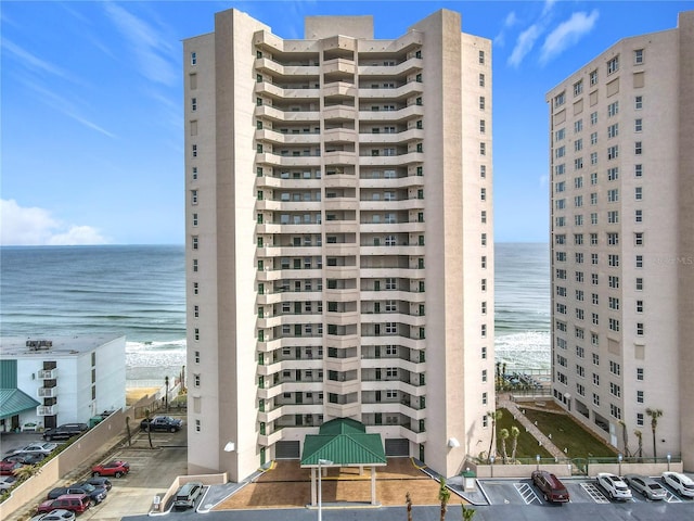 view of building exterior with a water view