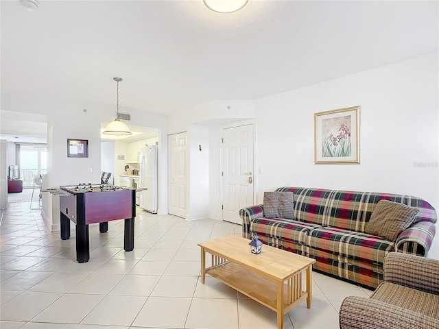 game room with light tile patterned flooring