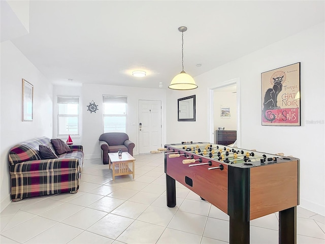 rec room with light tile patterned flooring