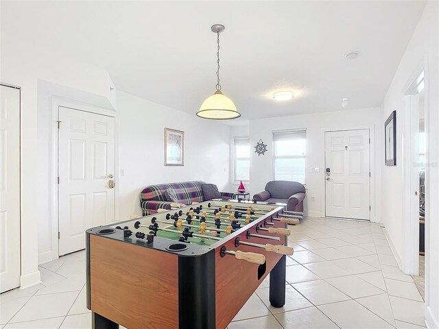 game room featuring light tile patterned floors