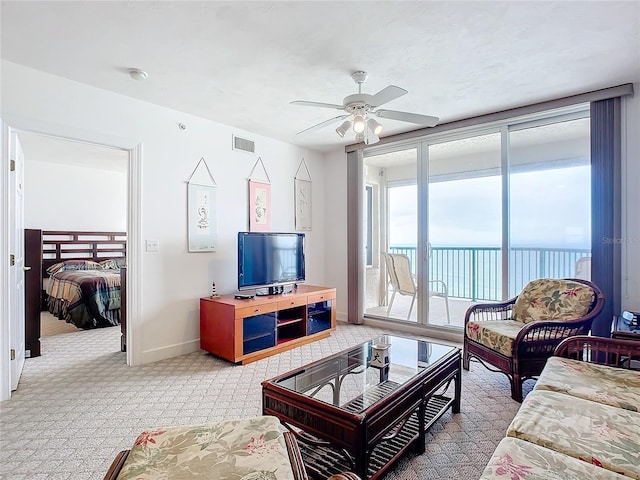 living room featuring ceiling fan