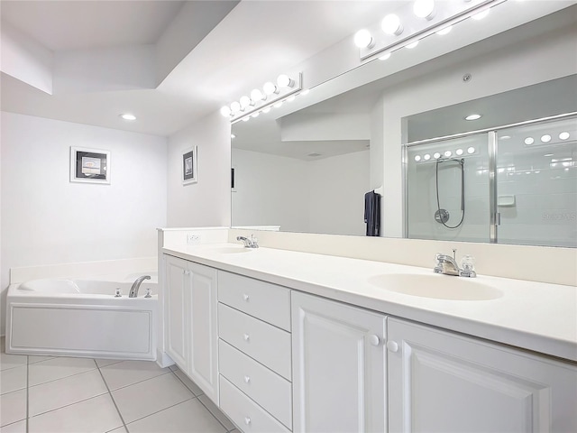 bathroom featuring vanity, tile patterned flooring, and independent shower and bath