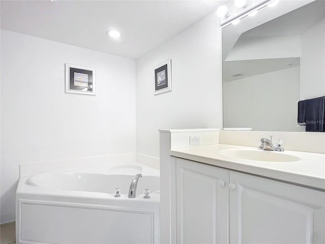 bathroom featuring a bathtub and vanity