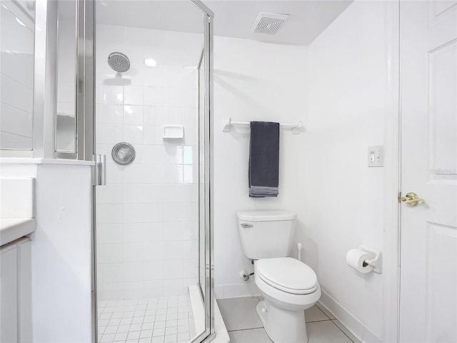 bathroom with walk in shower, tile patterned floors, and toilet