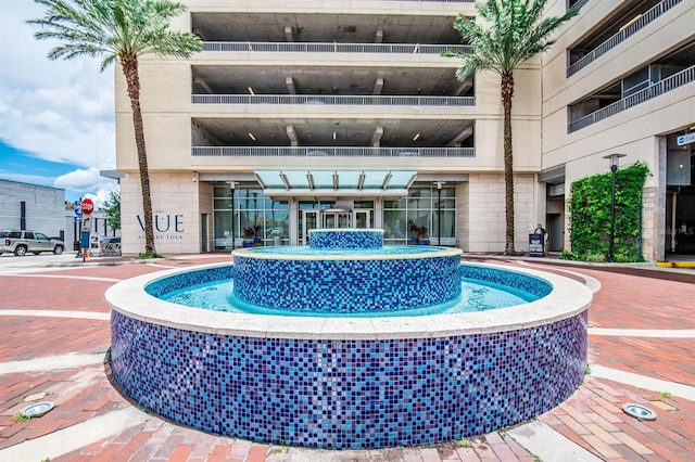 view of pool featuring pool water feature