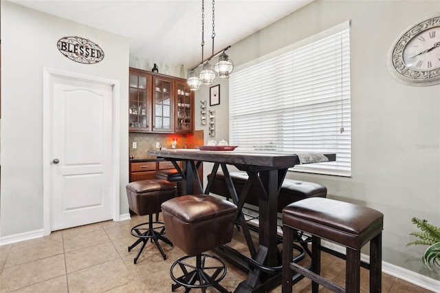 dining room with light tile patterned flooring